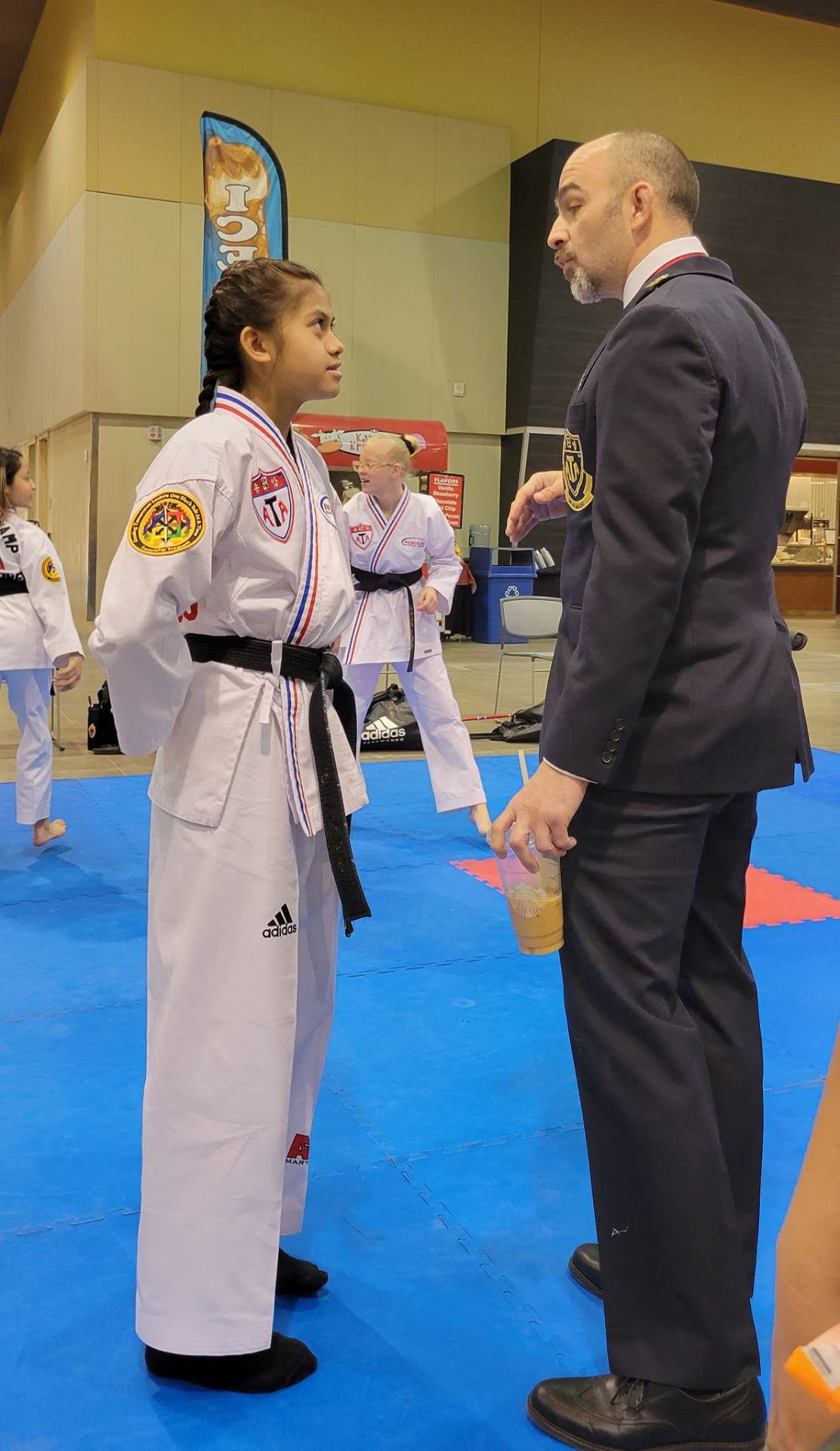 Master McCoig walking a student through a technique