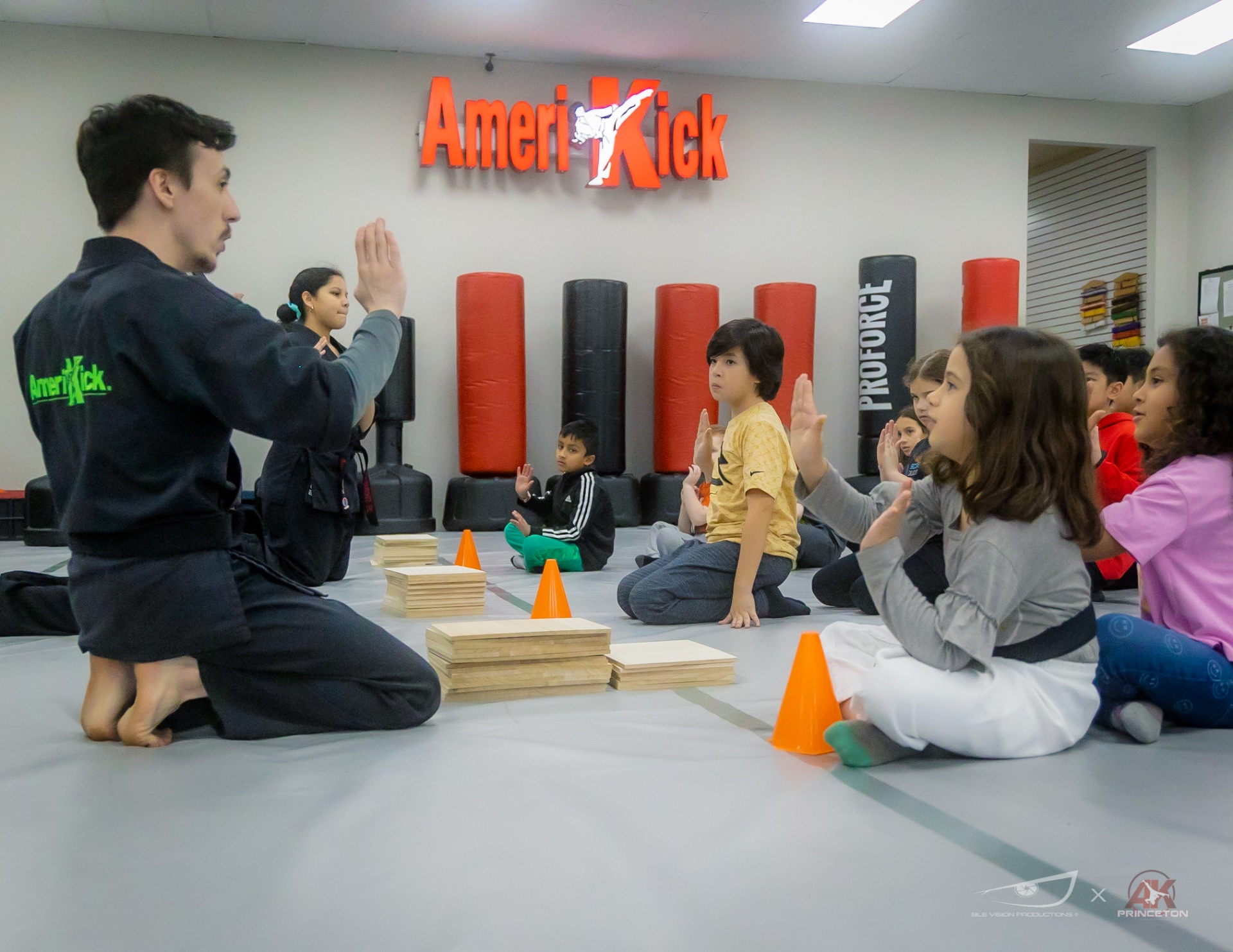 Birthday child leading a karate move